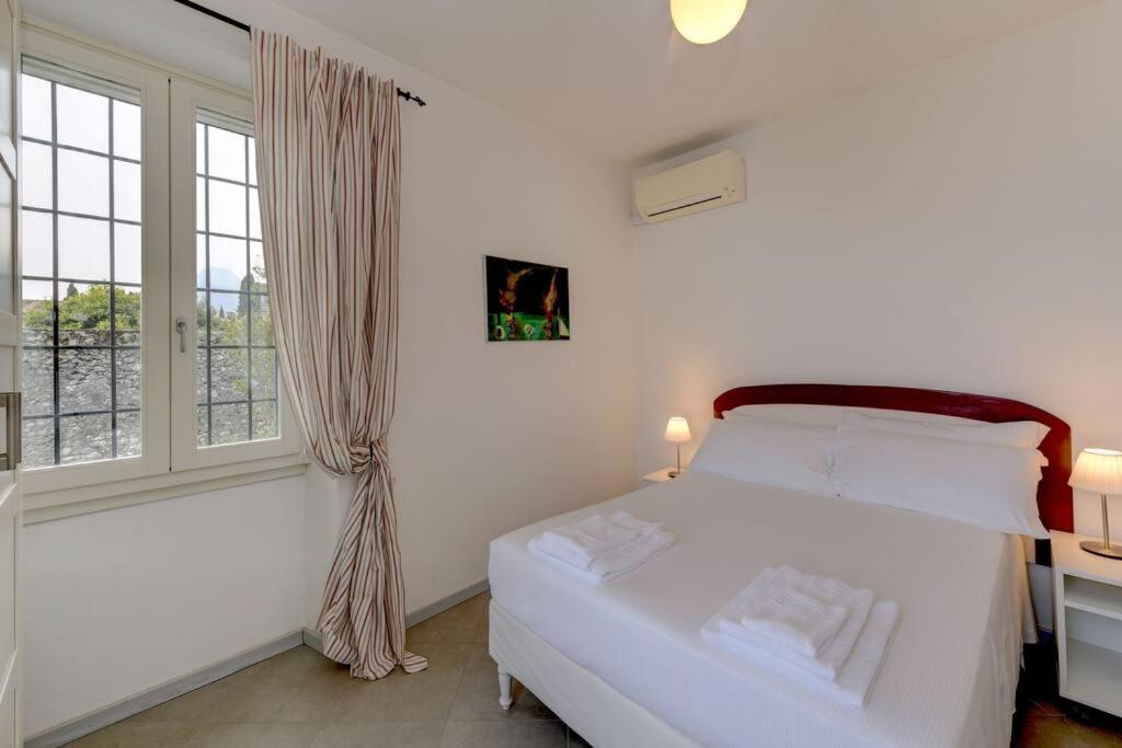 Oleandro Apartment Directly On The Lake 가르냐노 외부 사진